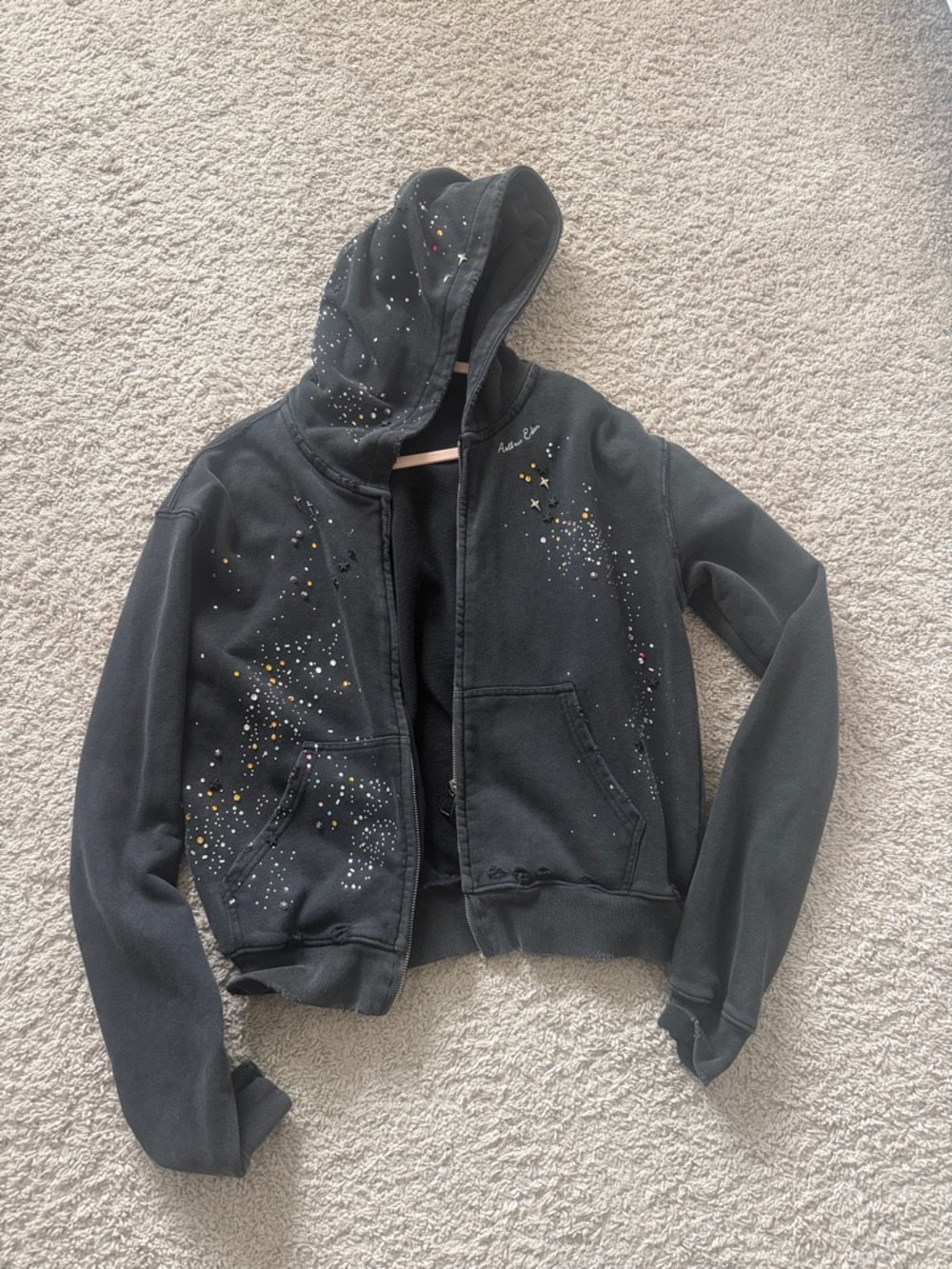 Aelfric Eden Black Hoodie with Paint Splatter and Star Accents